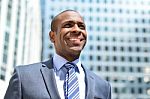 Handsome Businessman Standing At Outdoors Stock Photo