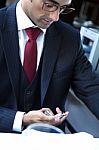 Handsome Businessman Watching Time Stock Photo