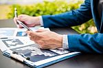 Handsome Businessman Wearing Suit And Using Modern Laptop Outdoo Stock Photo