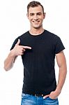 Handsome Casual Man Pointing Stock Photo