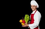 Handsome Chef Holding Vegetables Bowl Stock Photo