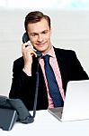 Handsome Corporate Man Communicating Stock Photo