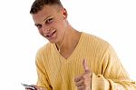 Handsome Male Showing Good Luck Sign Stock Photo