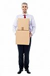 Handsome Male With With Stack Of Boxes Stock Photo