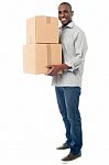 Handsome Male With With Stack Of Boxes Stock Photo