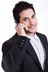 Handsome Young Business Man On A Phone Call Stock Photo