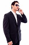 Handsome Young Business Man Talking On Phone Stock Photo