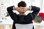 Handsome Young Businessman Relaxing One Moment In The Office Stock Photo