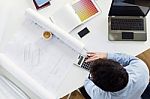 Handsome Young Businessman Working In The Office Stock Photo