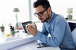 Handsome Young Businessman Working In The Office Stock Photo