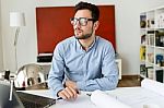 Handsome Young Businessman Working In The Office Stock Photo