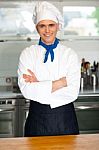 Handsome Young Chef Posing In Uniform Stock Photo