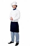 Handsome Young Cook Posing In Uniform Stock Photo