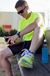 Handsome Young Man Listening To Music After Running Stock Photo