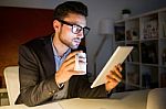 Handsome Young Man Working With Digital Tablet In The Office Stock Photo