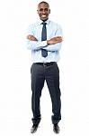 Happy African Businessman Arms Folded Stock Photo