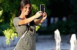 Happy Beautiful Girl Taking A Selfie Photo In Park Stock Photo