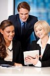 Happy Business Team At The Office Stock Photo