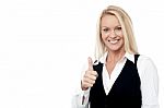 Happy Business Woman Giving Thumbs Up Stock Photo