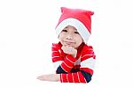 Happy Christmas Asian Boy Laying And Smiling Stock Photo