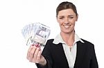 Happy Corporate Woman Holding Cash Stock Photo