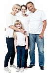 Happy Couple With Cheerful Children Stock Photo