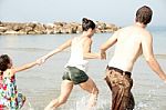 Happy Family On Beach Stock Photo