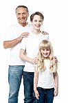 Happy Father With Children Standing In Row Stock Photo