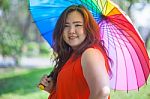 Happy Woman With Umbrella Stock Photo