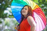 Happy Woman With Umbrella Stock Photo