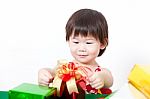 Happy Little Girl With Gift Box Stock Photo