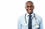 Happy Male Doctor With Stethoscope Stock Photo