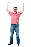 Happy Man Celebrating Arms Up Success Stock Photo