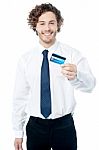 Happy Man Displaying His Cash Card Stock Photo