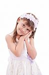 Happy Smiling Little Girl On White Background In Studio Stock Photo