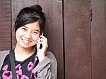 Happy Smiling Teenage Girl With The Mobile Phone Stock Photo