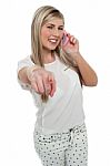 Happy Teen Girl On Call Pointing Towards You Stock Photo