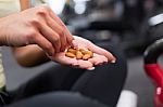 Happy Woman Having A Break From Exercising In Health Club Stock Photo