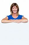 Happy Woman Standing Behind Whiteboard Stock Photo