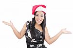 Happy Woman With Santa Hat On A White Background Stock Photo