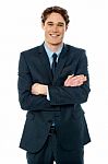 Happy Young Businessman Smiling At The Office Stock Photo