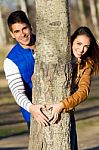 Happy Young Couple  In Love Having Fun At The Park Stock Photo