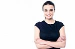 Happy Young Girl Posing, Arms Crossed Stock Photo