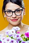 Happy Young Girl With Flowers Stock Photo