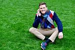 Happy Young Man Communicating, Posing Outdoors Stock Photo