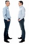 Happy Young Men Standing Together Stock Photo