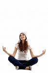 Health Conscious Girl Doing Meditation Stock Photo