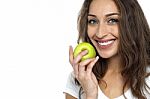 Health Conscious Woman About To Eat Fresh Green Apple Stock Photo