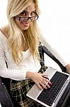 High Angle View Of Happy Female Working On Laptop Stock Photo