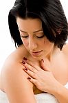 High Angle View Of Woman Touching Her Body On White Background Stock Photo